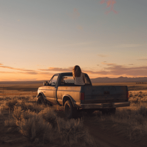 Woman in bed of truck