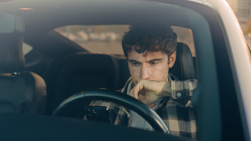 The Dangers of Watching Videos While Driving in Kentucky