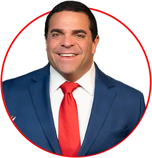 Darryl Isaacs smiling and holding a hammer in a round photo