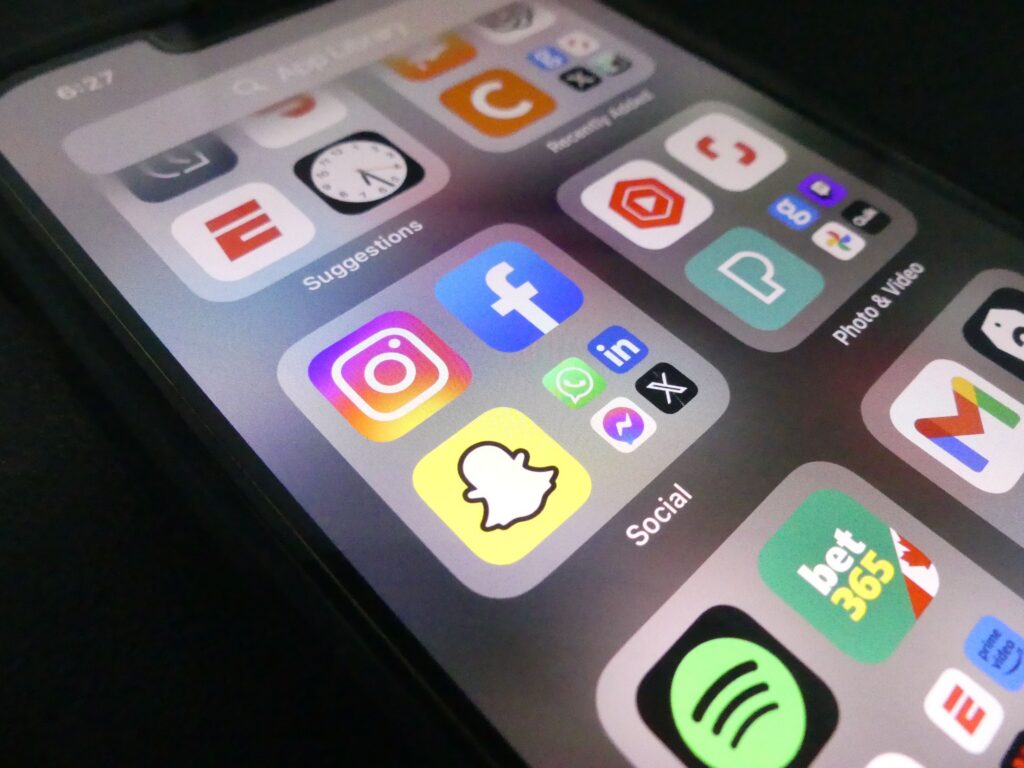 Close-up of a smartphone with social media app icons