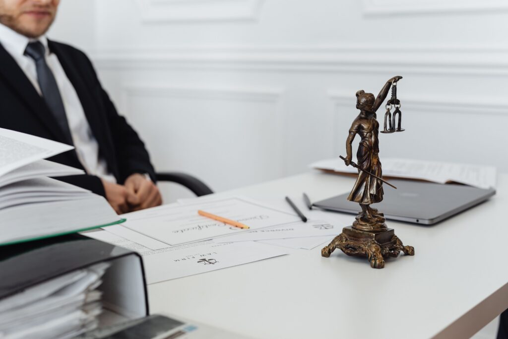 Personal injury attorney reviewing evidence, liability, and legal options