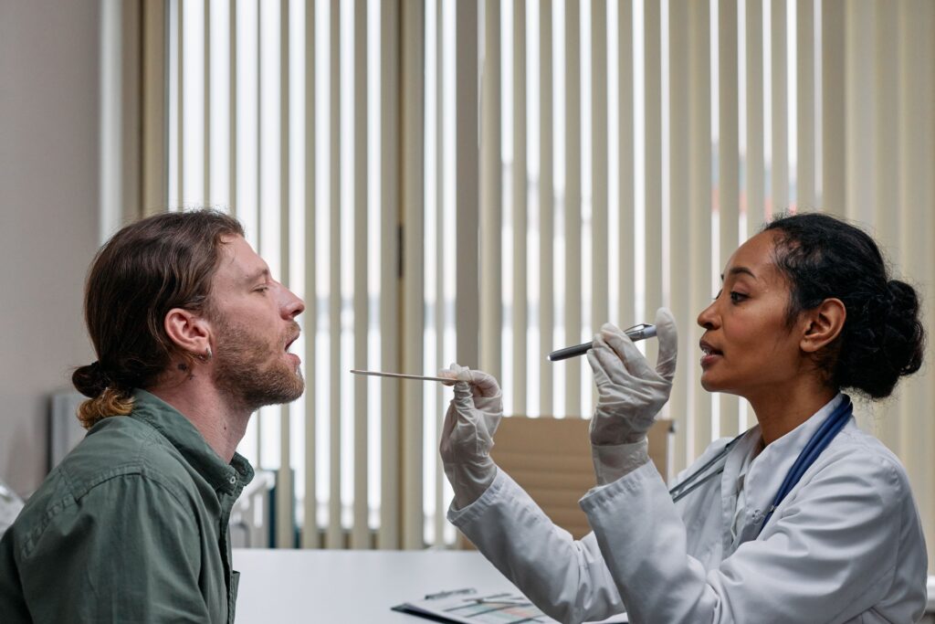 A doctor conducts a medical examination with a patient