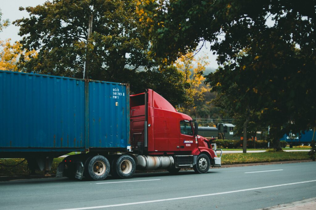 A cargo truck traveling on the road